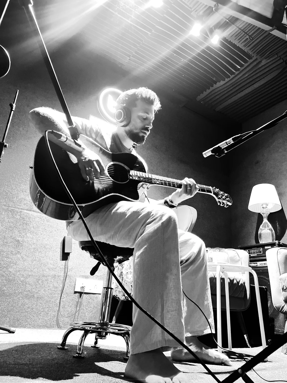 George V recording acoustic guitar