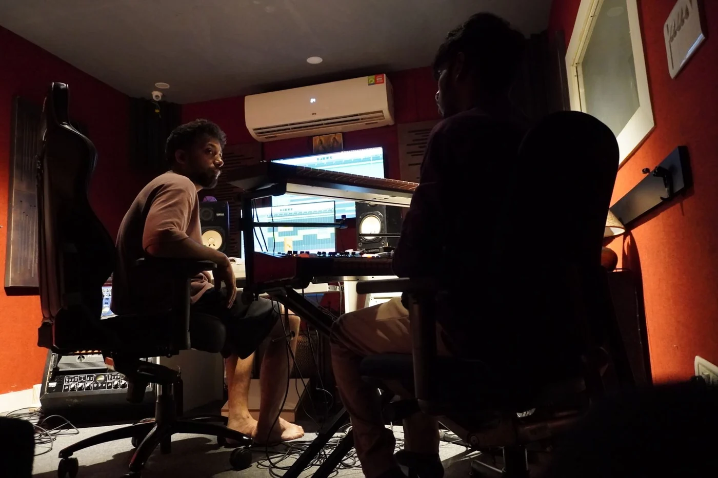 Dark studio session with artists